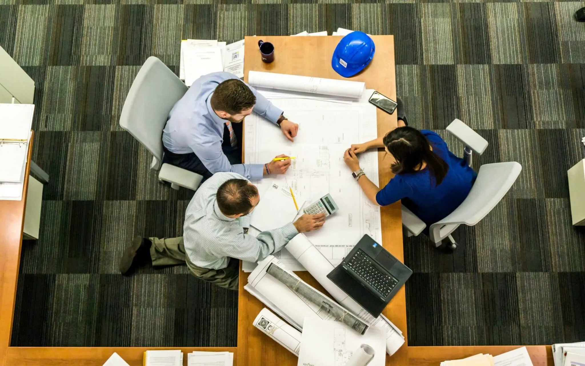 team at manufacturing firm